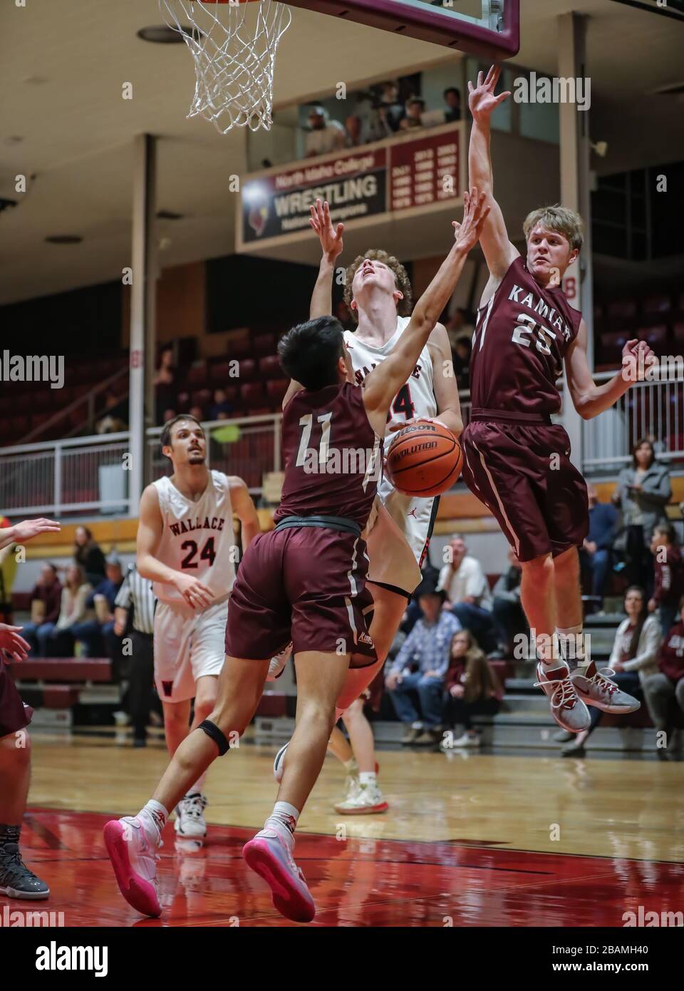 Basketball action with Wallace vs Kamiah High School in Coer d'Alene