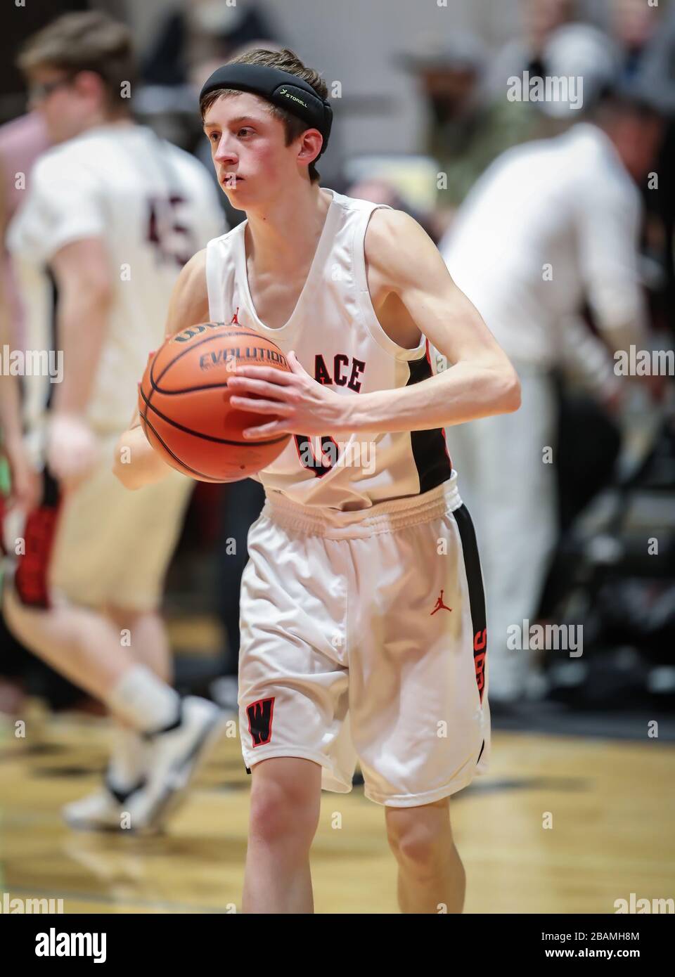 Basketball action with Wallace vs Kamiah High School in Coer d'Alene