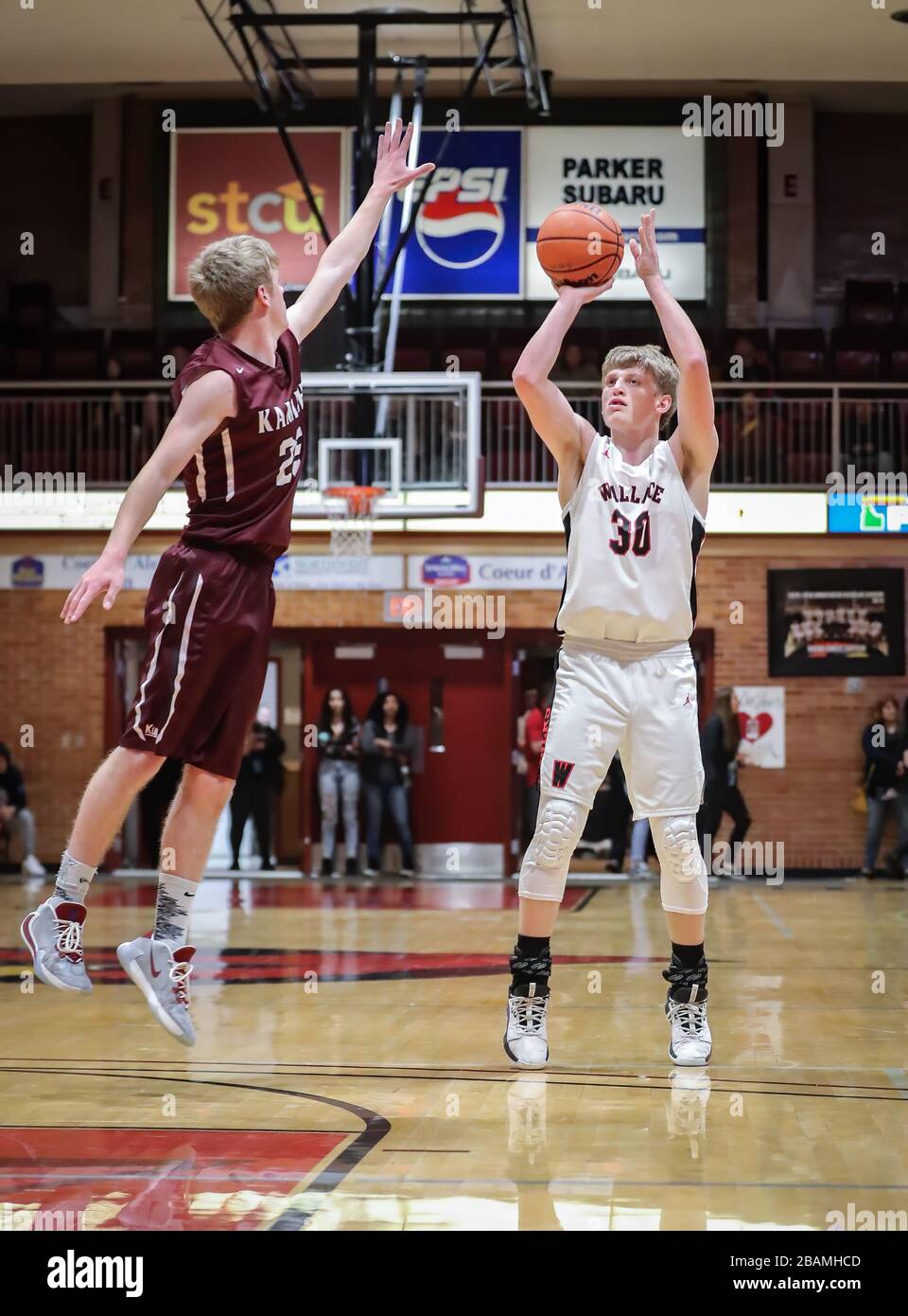 Basketball action with Wallace vs Kamiah High School in Coer d'Alene