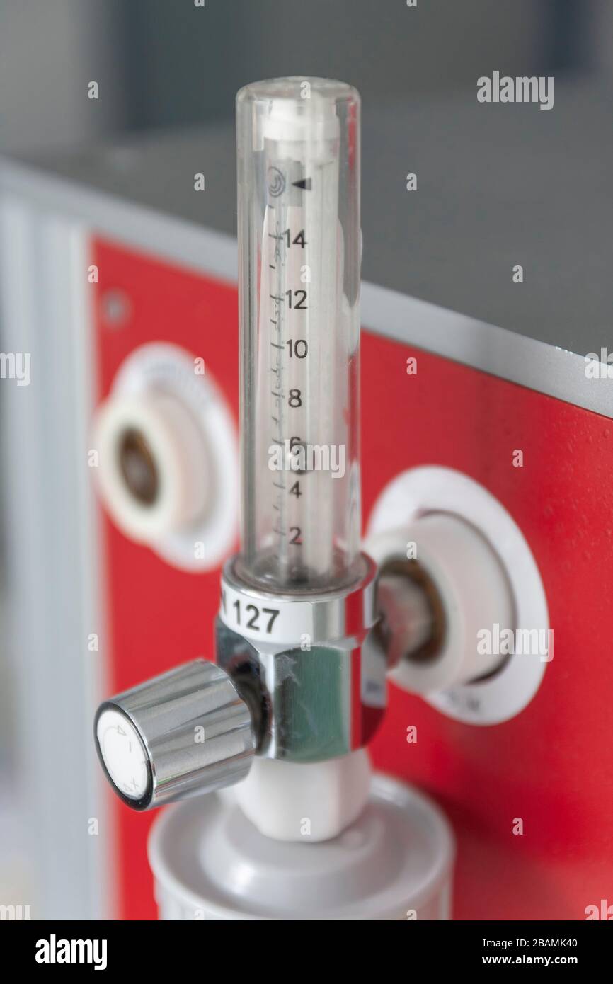 Medical oxygen flow meter is connected to beam. Oxygen therapy is used in patient with pneumonia