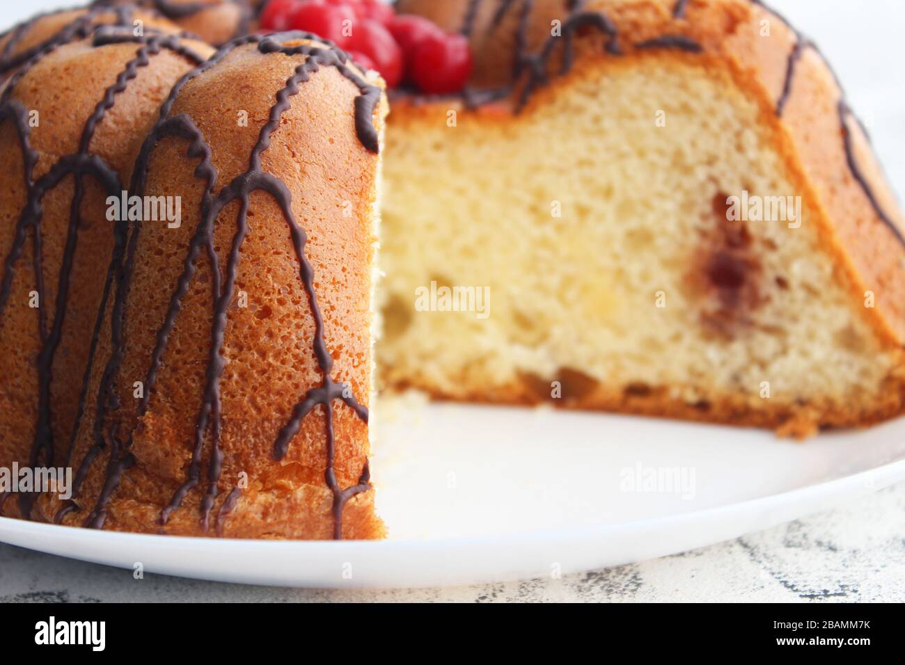 Homemade cake with fresh cherry on dark background, top view, copy space Stock Photo