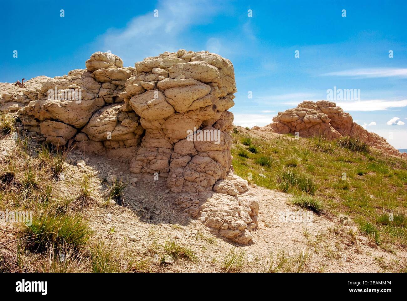 A rock outcrop on a sunny, summer day in the Badlands National Park in South Dakota. Stock Photo