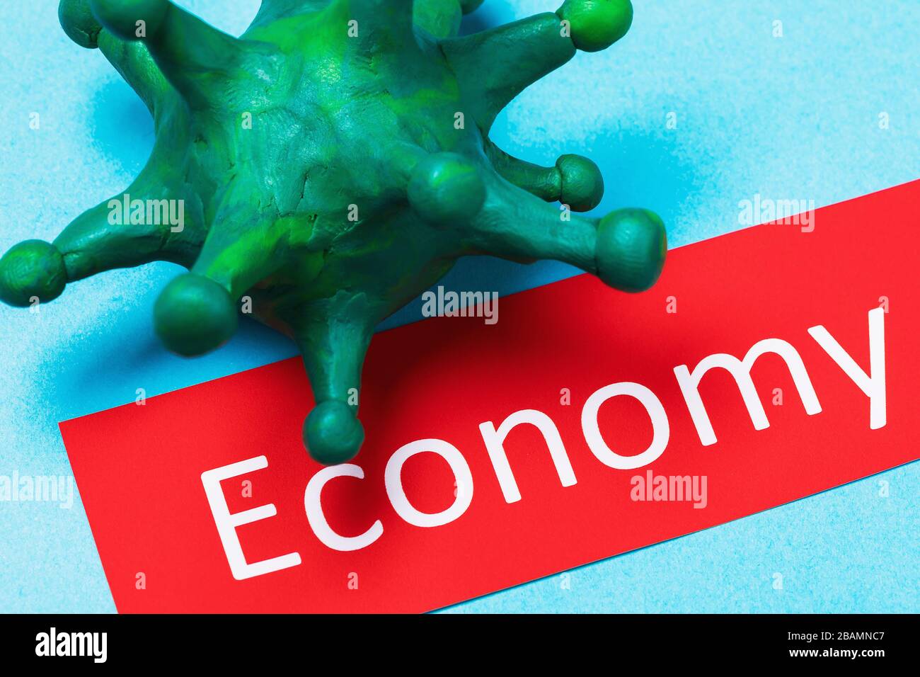 Tag with text and coronavirus. The concept of the impact of the COVID-19 pandemic on the global economy Stock Photo