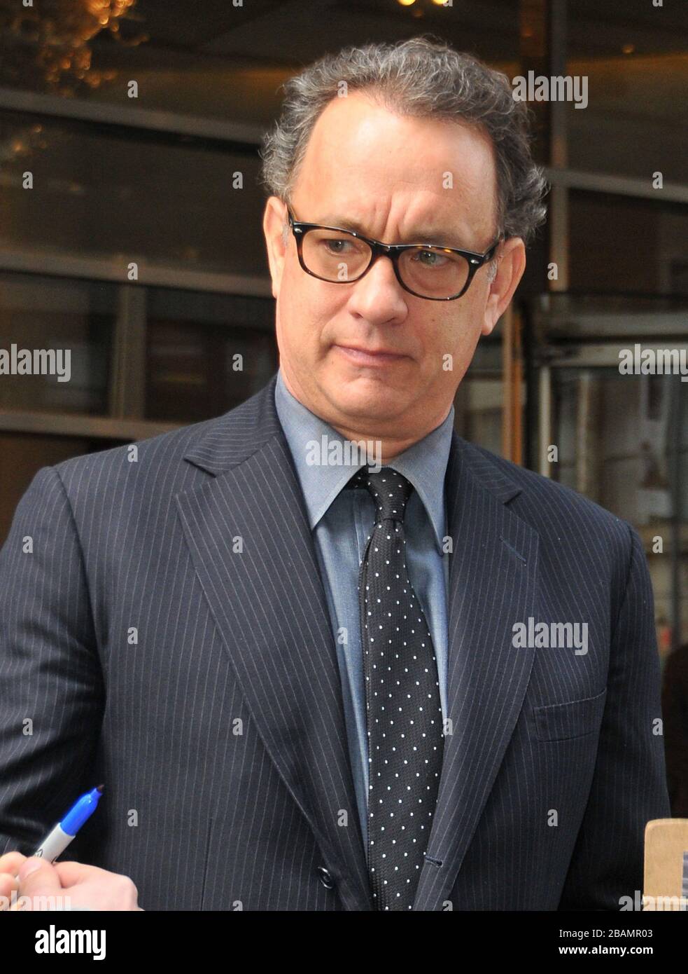 Manhattan, United States Of America. 04th Mar, 2010. NEW YORK - MARCH 04: (EXCLUSIVE COVERAGE) Actor Tom Hanks leaves his New York City hotel. on March 4, 2010 in New York City. People: Tom Hanks Credit: Storms Media Group/Alamy Live News Stock Photo