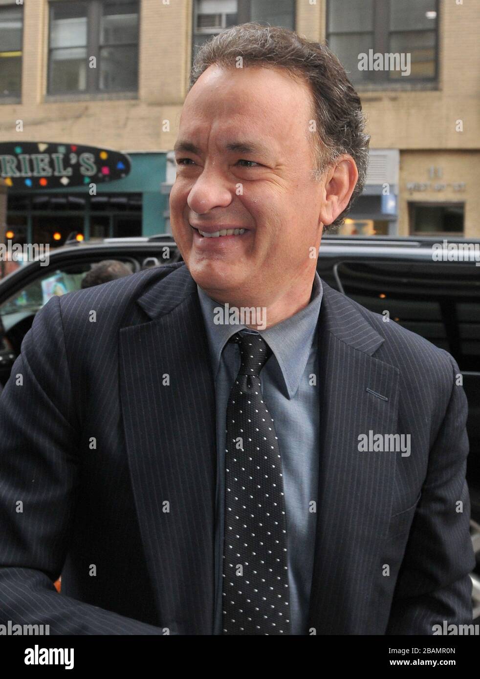 Manhattan, United States Of America. 04th Mar, 2010. NEW YORK - MARCH 04: Actor Tom Hanks entering his New York City hotel. on March 4, 2010 in New York City. People: Tom Hanks Credit: Storms Media Group/Alamy Live News Stock Photo