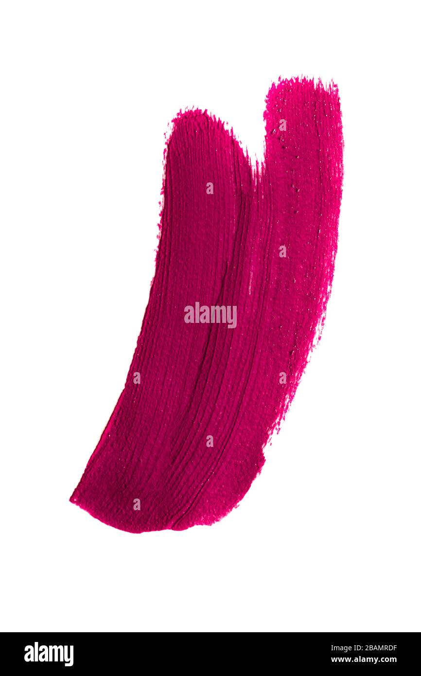 Pink purple lipstick cosmetic product brush stroke swipe sample. Swatch smudge smear isolated on white background. Cream makeup texture. Stock Photo