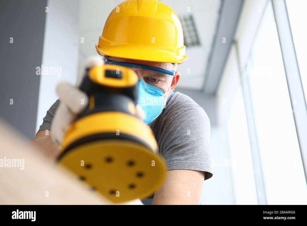 Concentrated man in face mask Stock Photo