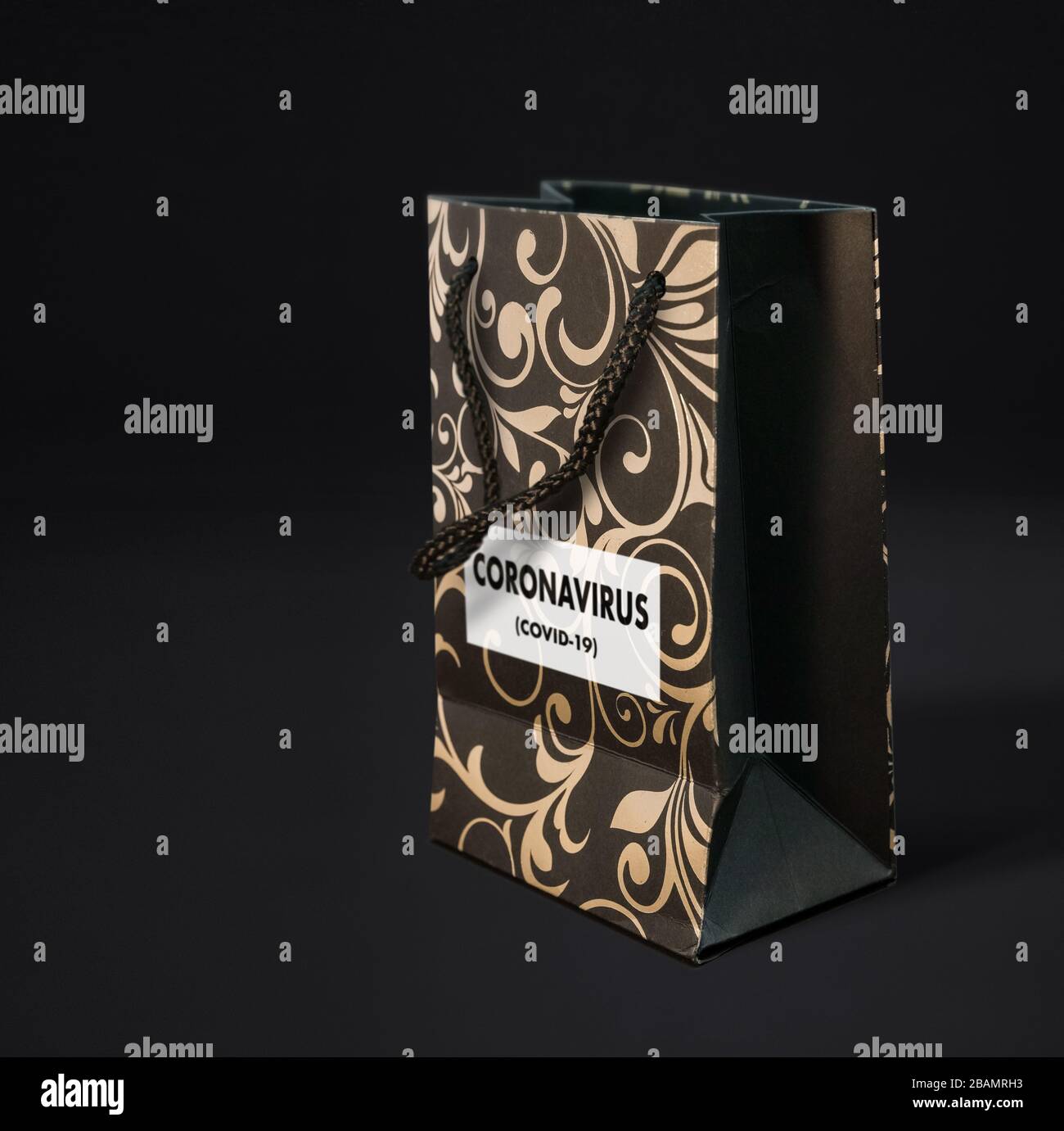 A gift bag on which is written Coronavirus covid19. Copyspace Stock