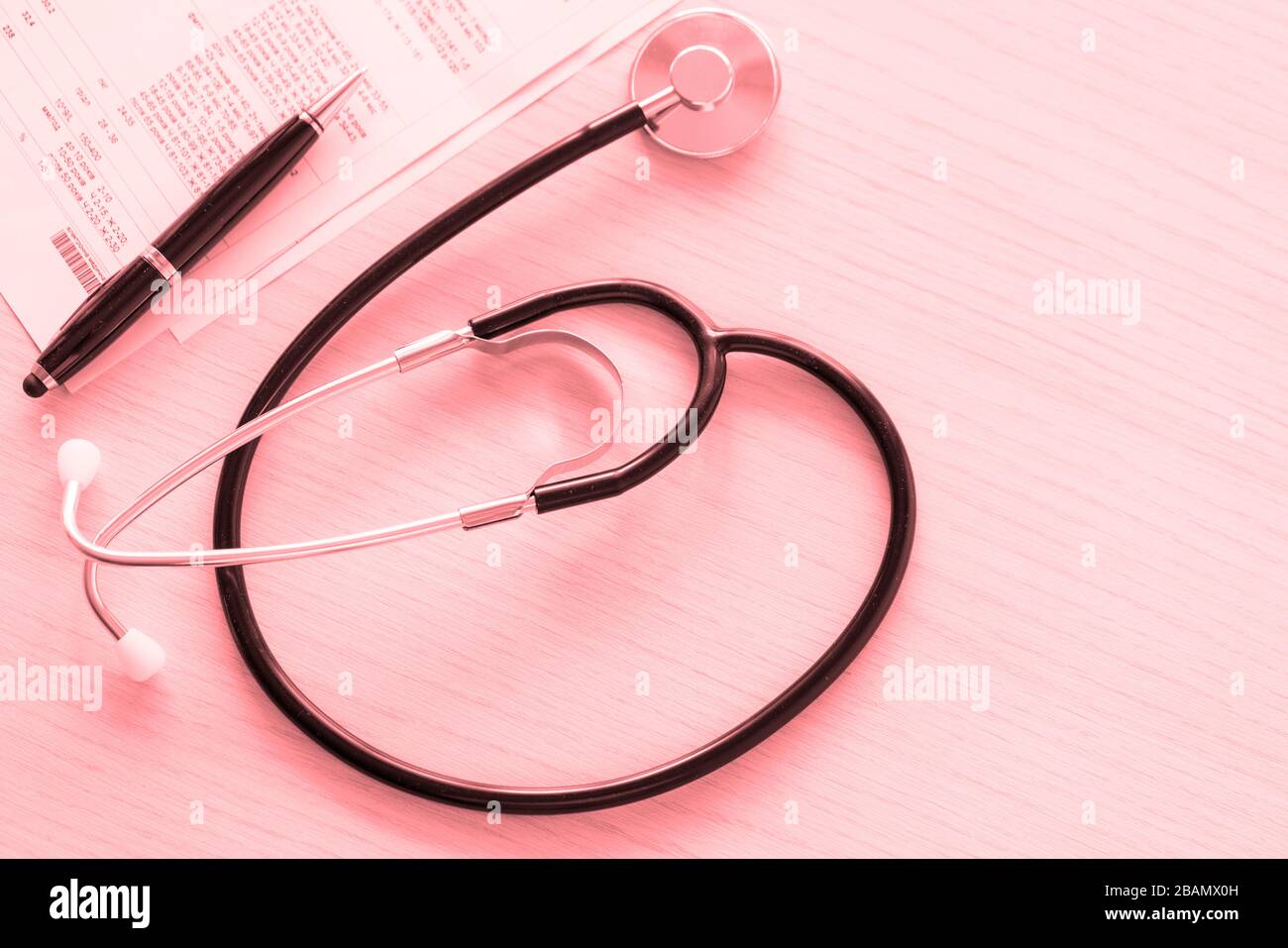 Stethoscope and testing results on doctors table on pink background, close  up and top view. Health care concept Stock Photo - Alamy