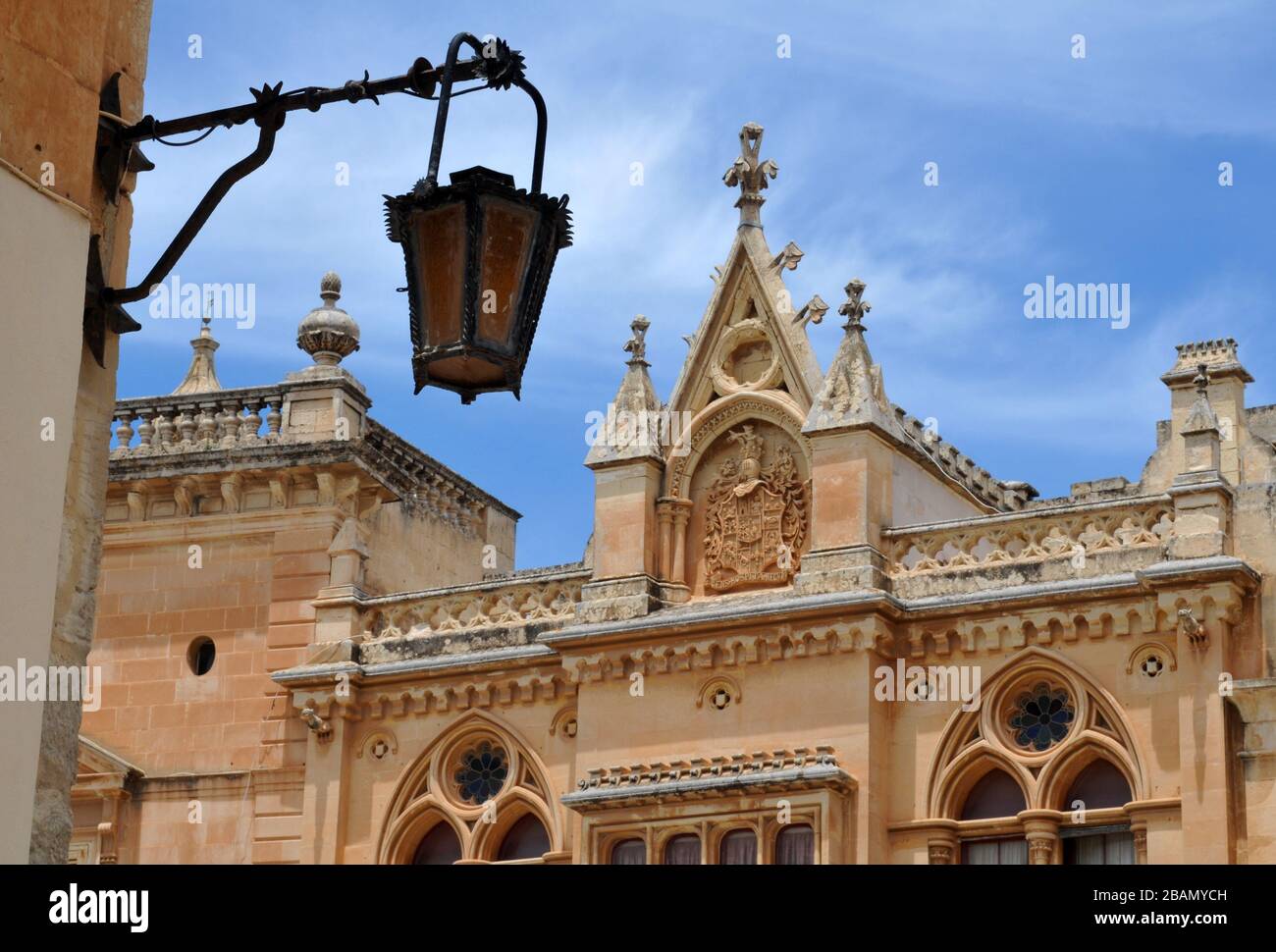 Detail of the elaborate roofline on a building in St. Paul's Square, at the heart of the historic walled city of Mdina, Malta. Stock Photo