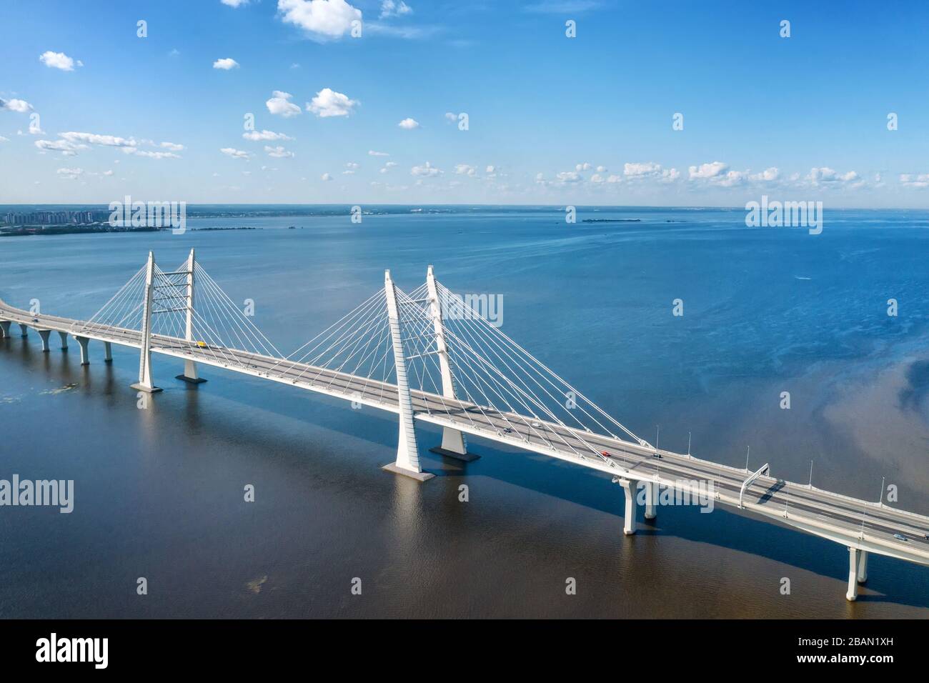 Cityscape with large cable stayed bridge on elevated highway aerial ...