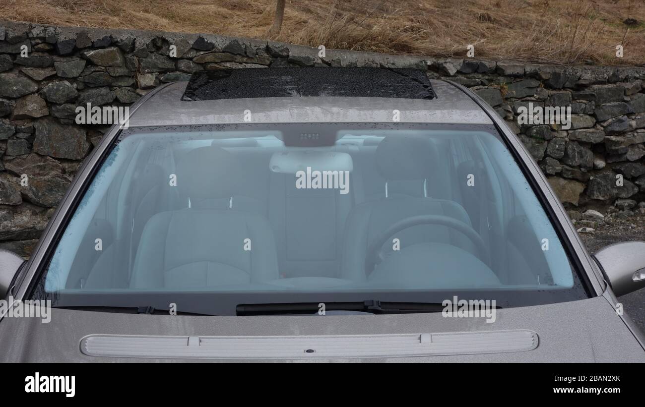 Glazed black hatch - sliding W211 pavilion sunroof, beige leather interior, metallic paint, aerial view, Stock Photo