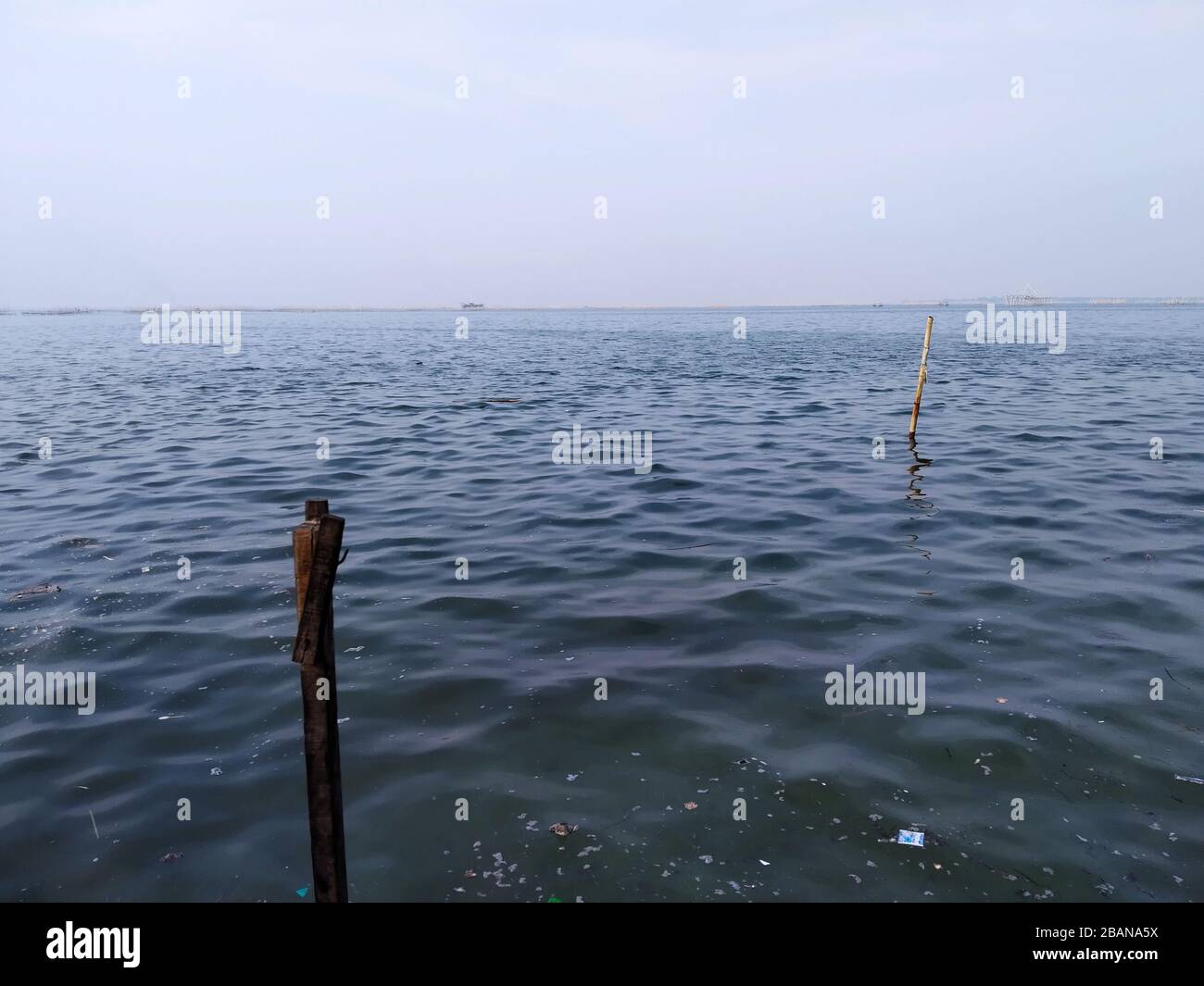 A view of sewage floating on the surface of the sea Stock Photo