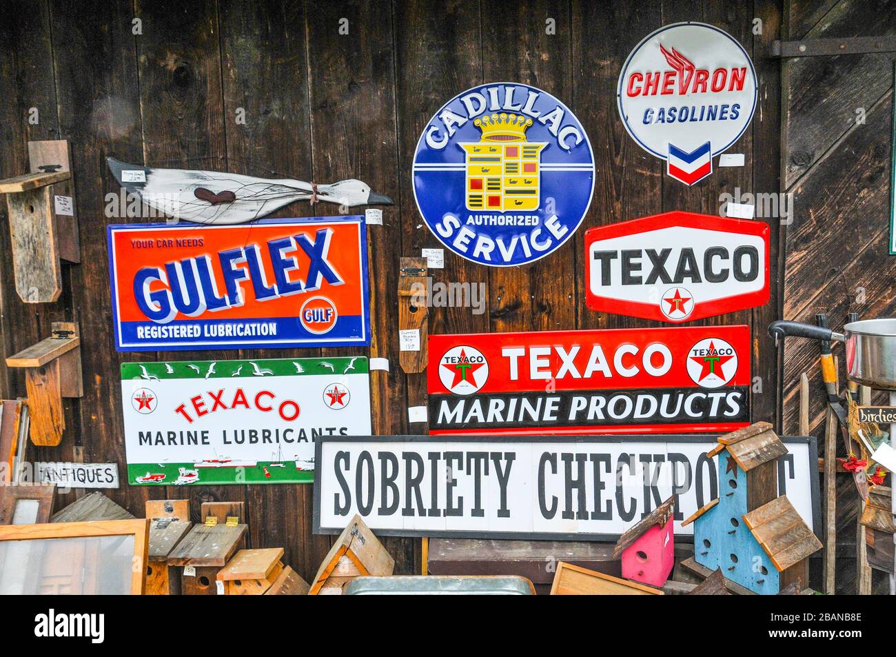 Variety of oil and automotive company metal signs Stock Photo