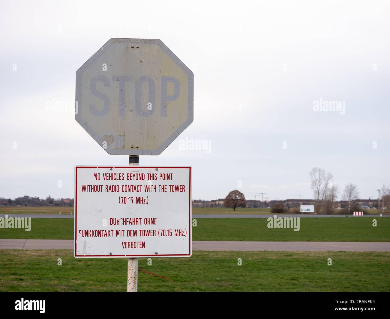 Old Stop Sign In Public City Park Tempelhofer Feld, Former Tempelhof Airport In Berlin, Germany Stock Photo