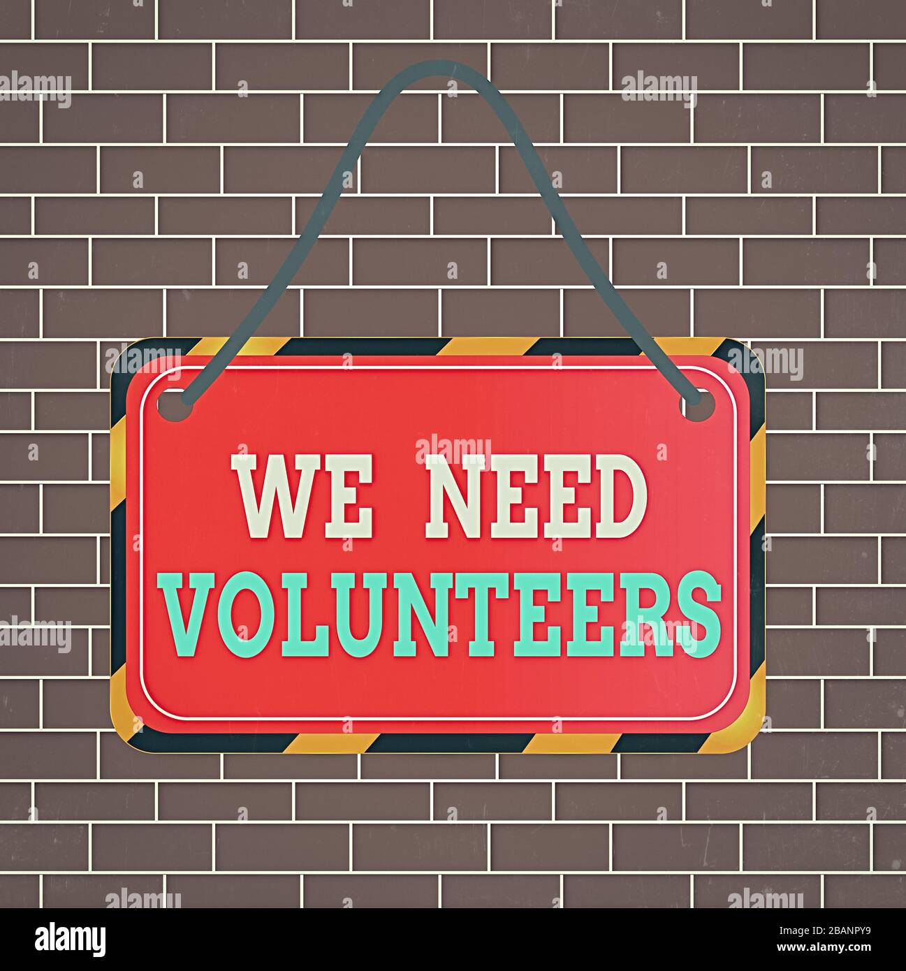 Text sign showing We Need Volunteers. Business photo showcasing someone who does work without being paid for it Board attached string color black yell Stock Photo