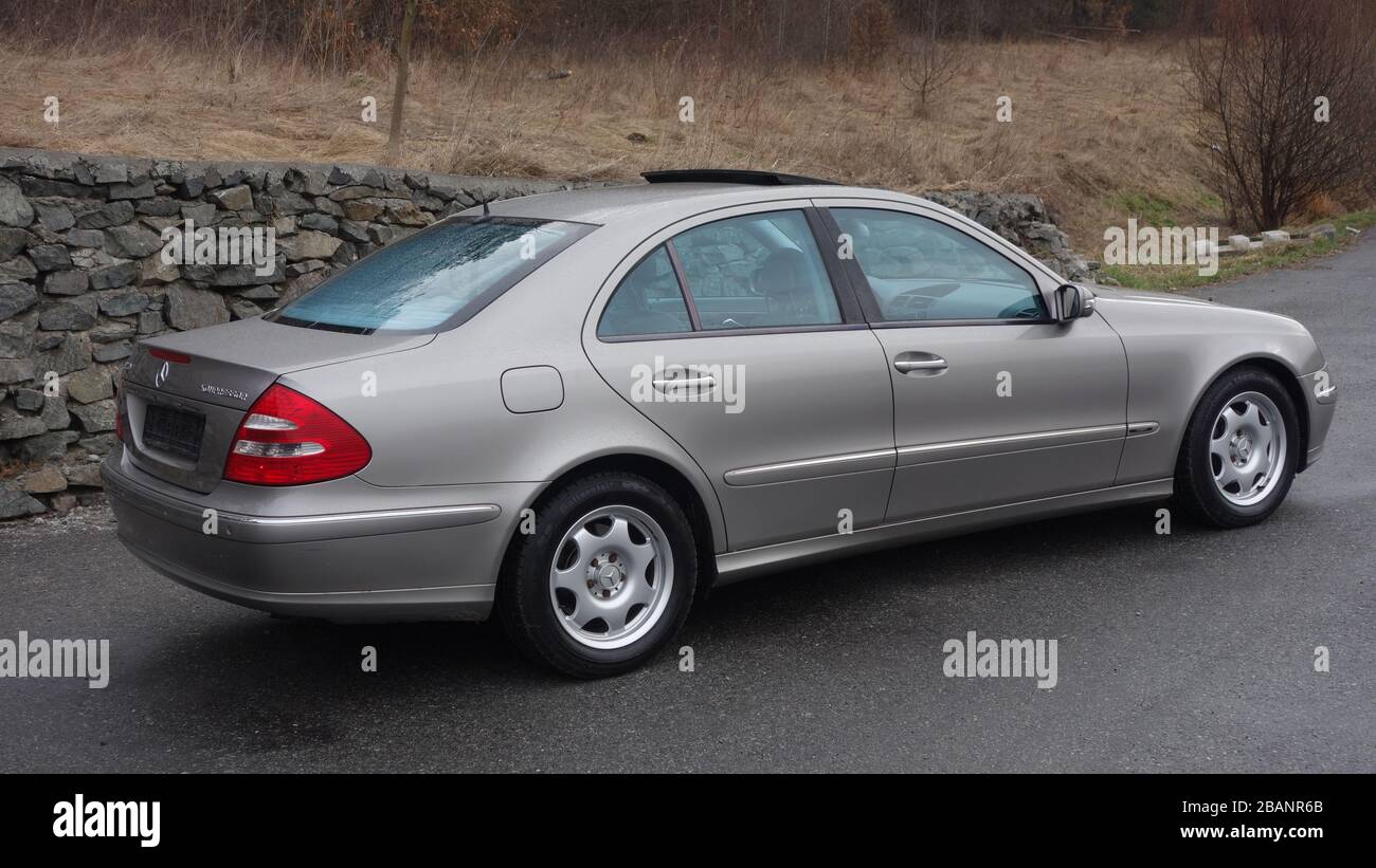 Beautiful Avantgarde Mercedes Benz W211, year 2008, manual transmission,  winter rims, isolated, no people, in an empty parking lot Stock Photo -  Alamy