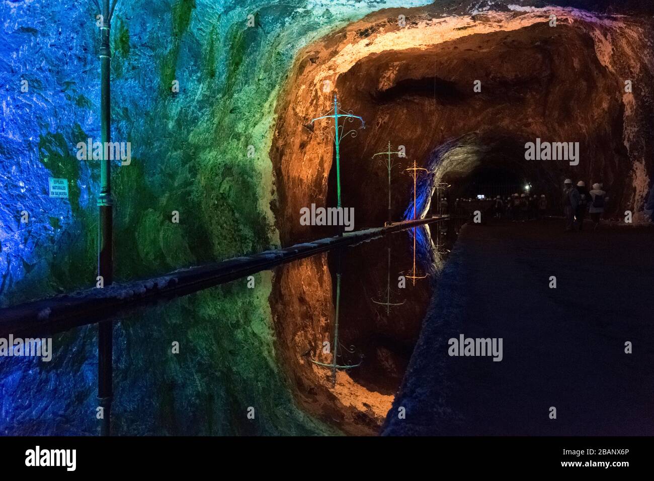 Nemocon, Cundinamarca / Colombia; March 24, 2018: mirror of water and walls illuminated with colored lights inside a salt mine Stock Photo