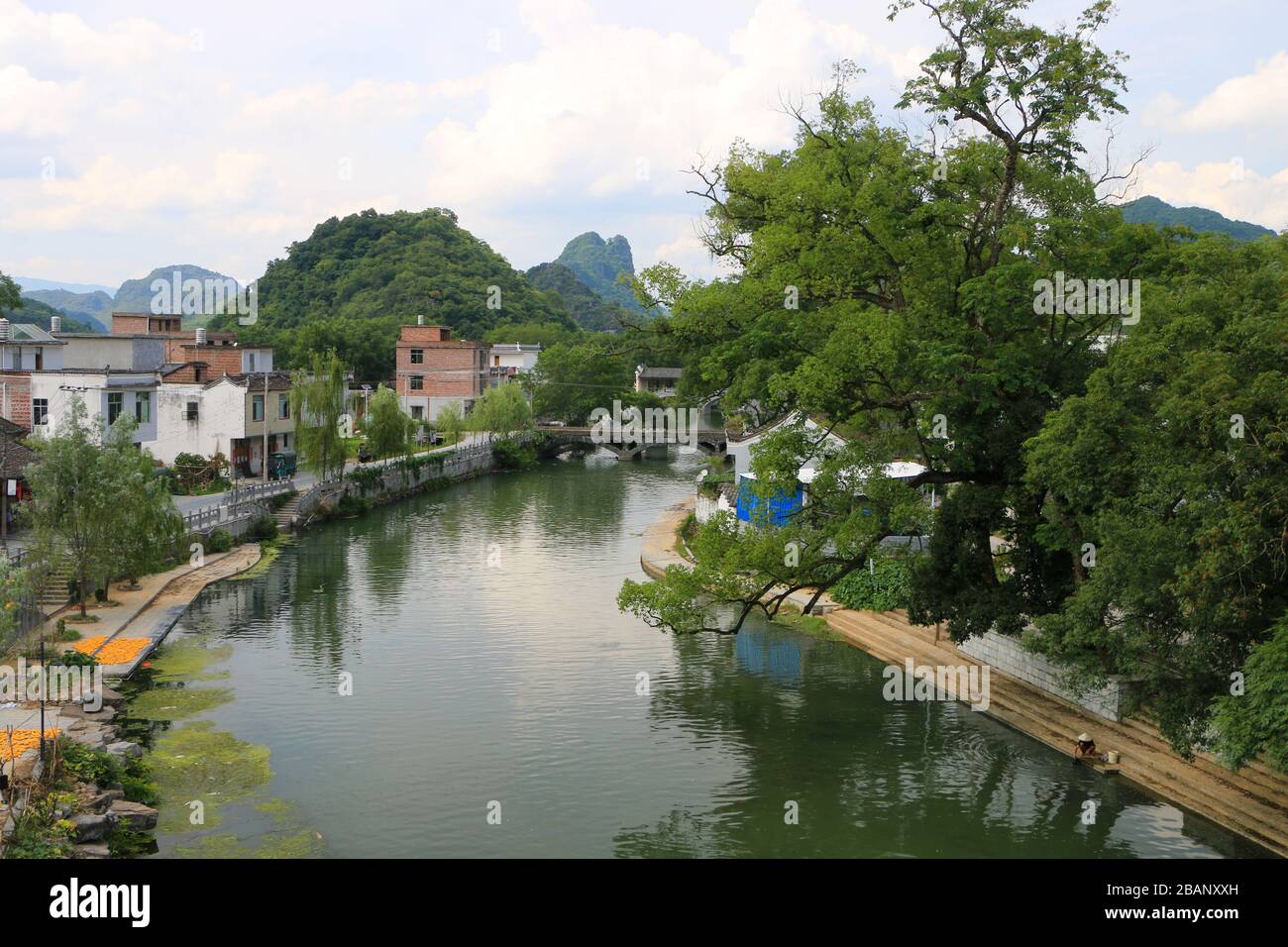 A small village next to a river Stock Photo