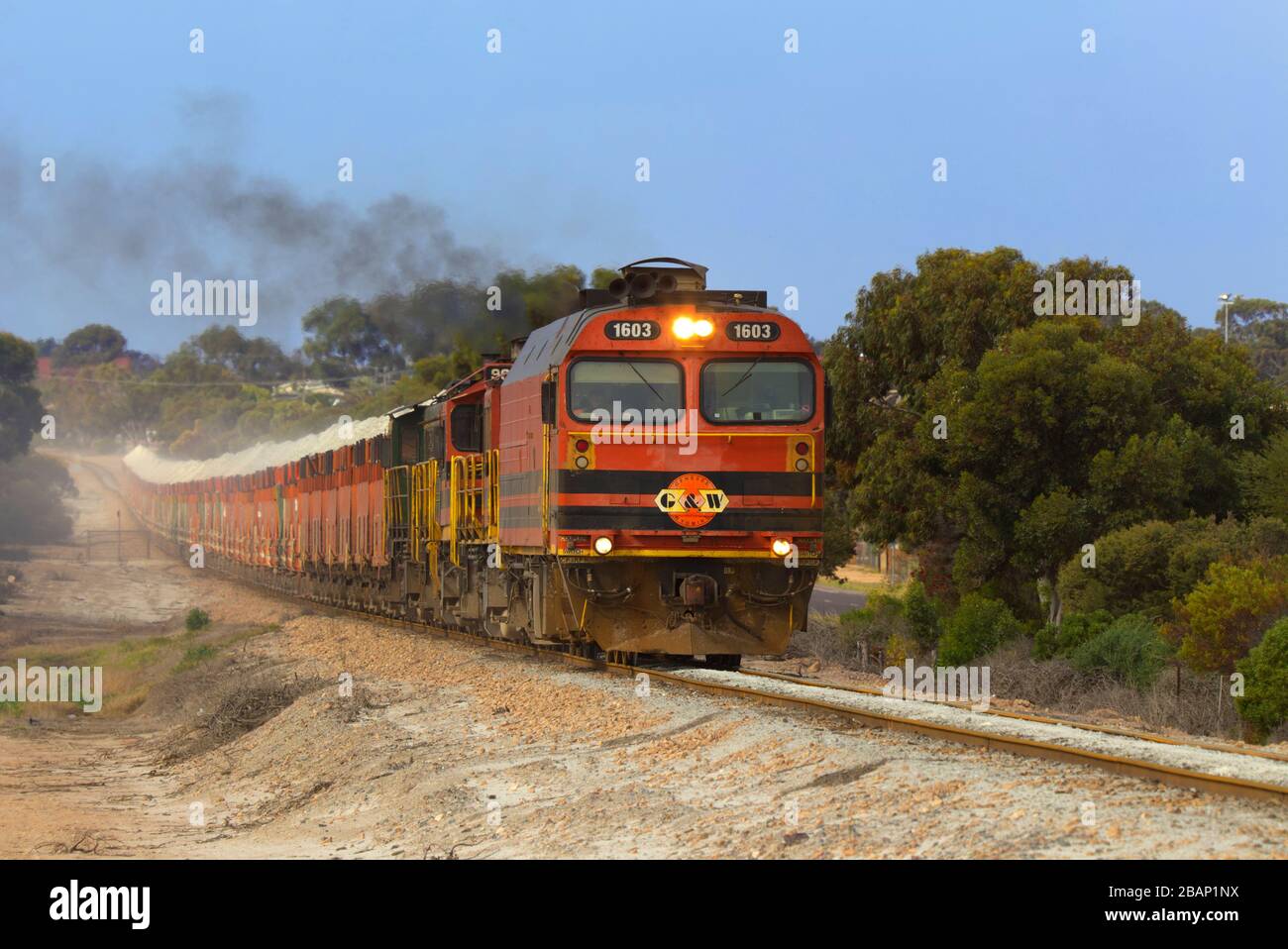 Freight train carrying gypsum running on an isolated line from Kevin to Port Thevenard near Ceduna South Australia Stock Photo