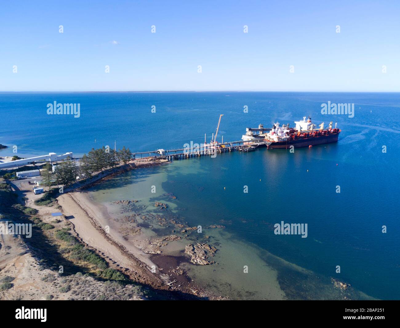 Bulk carrier ship loading mineral sands for export Port Thevenard South Australia Stock Photo