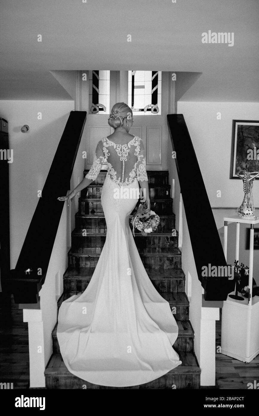 The bride in a beautiful wedding dress and her bridal bouquet of ...