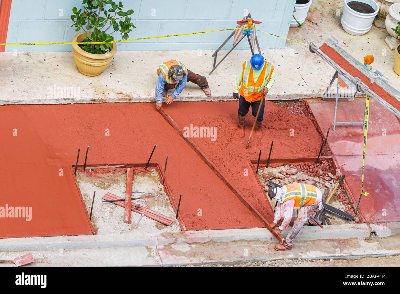 Miami Beach Florida,Ocean Drive,under new construction site building builder,renovation,repair,city street,replacement,man men male adult adults,worke Stock Photo