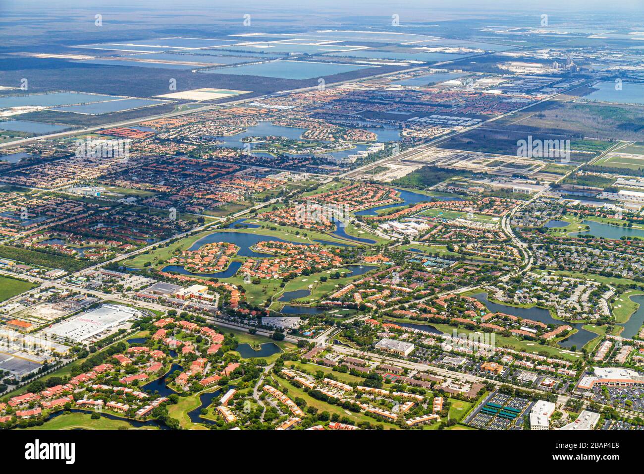 Miami Florida,Doral,aerial window seat view,departing MIA,roads,neighborhoods,golf course,edge of Everglades,FL110516044 Stock Photo