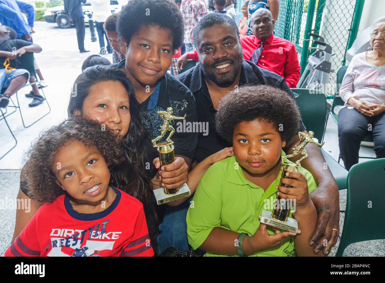North Miami Beach Florida,Police Station,Neighborhood Football League Awards Ceremony,Black Blacks African Africans ethnic minority,boy boys,male kid Stock Photo