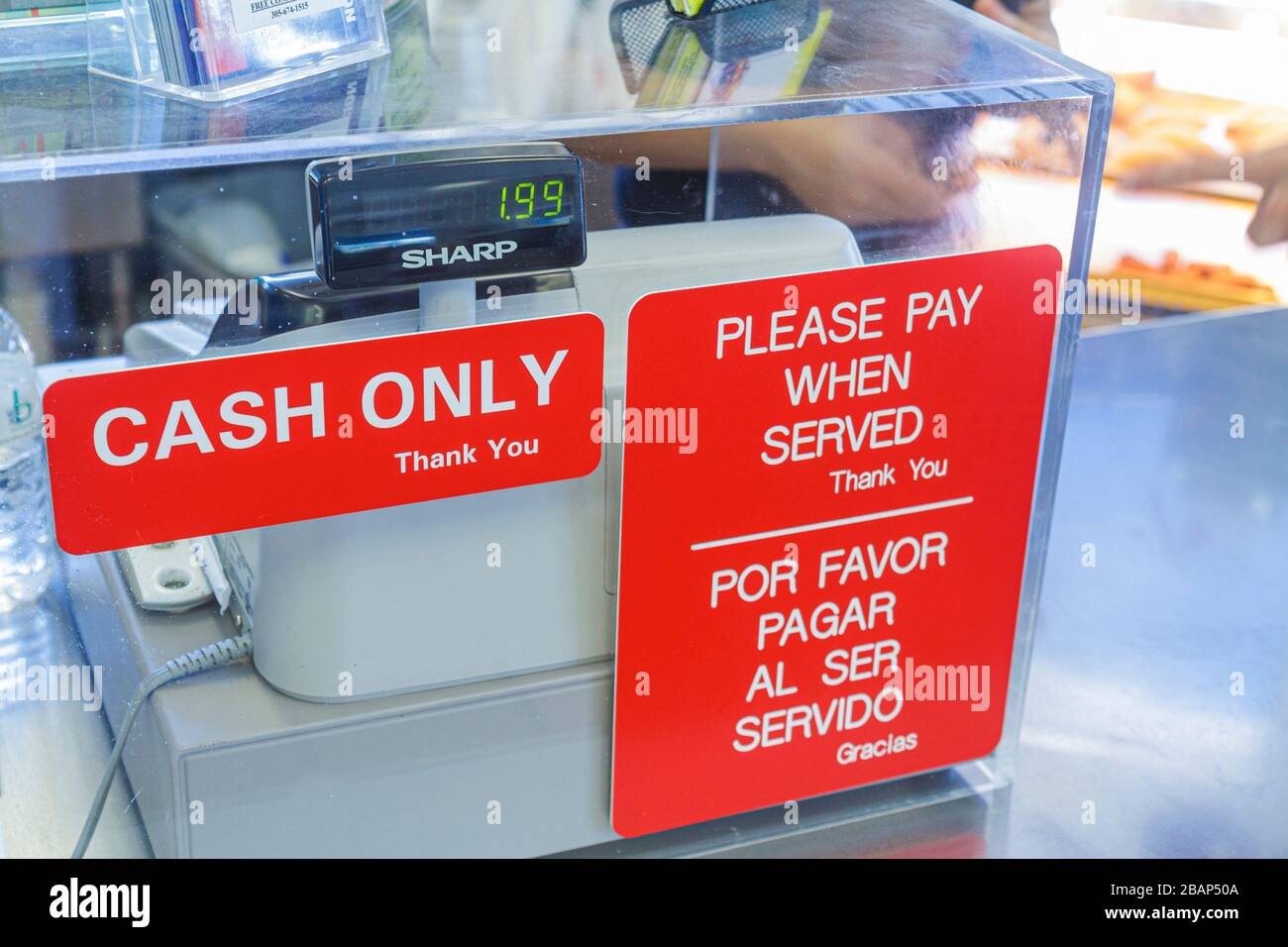 Miami Beach Florida,Sixth 6th Street,Las Olas Cafe Cuban cafeteria restaurant,sign cash only Spanish English language,bilingual please pay when served Stock Photo