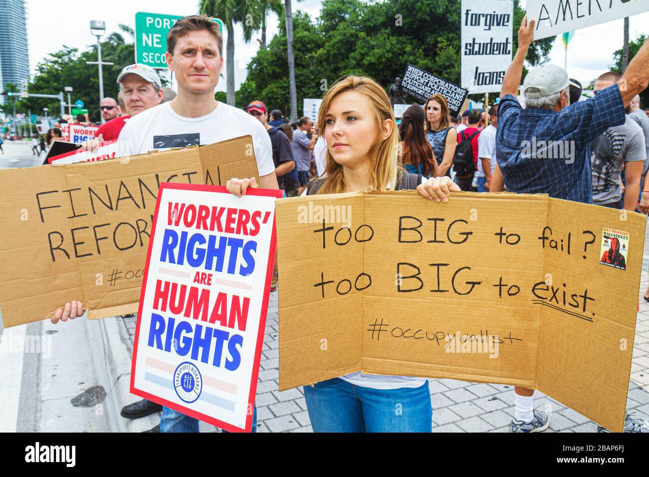 Miami Florida,Biscayne Boulevard,Freedom Torch,Occupy Miami,demonstration,protest,protesters,anti Wall Street,banks,corporate greed,sign,poster,messag Stock Photo