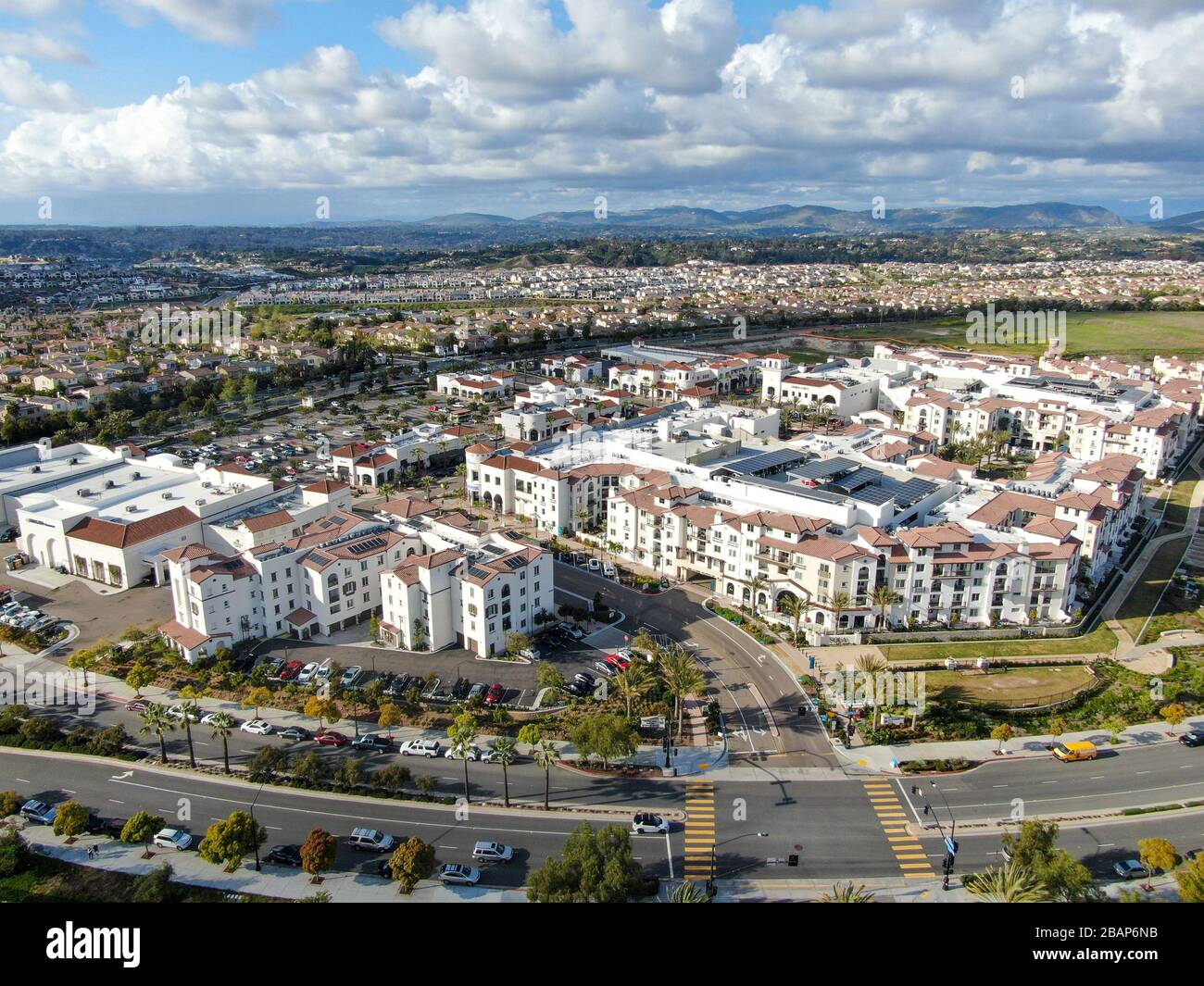 Aerial view of typical small town shopping center with parking . Carmel Valley, San Diego, California, USA. March 28th, 2020 Stock Photo