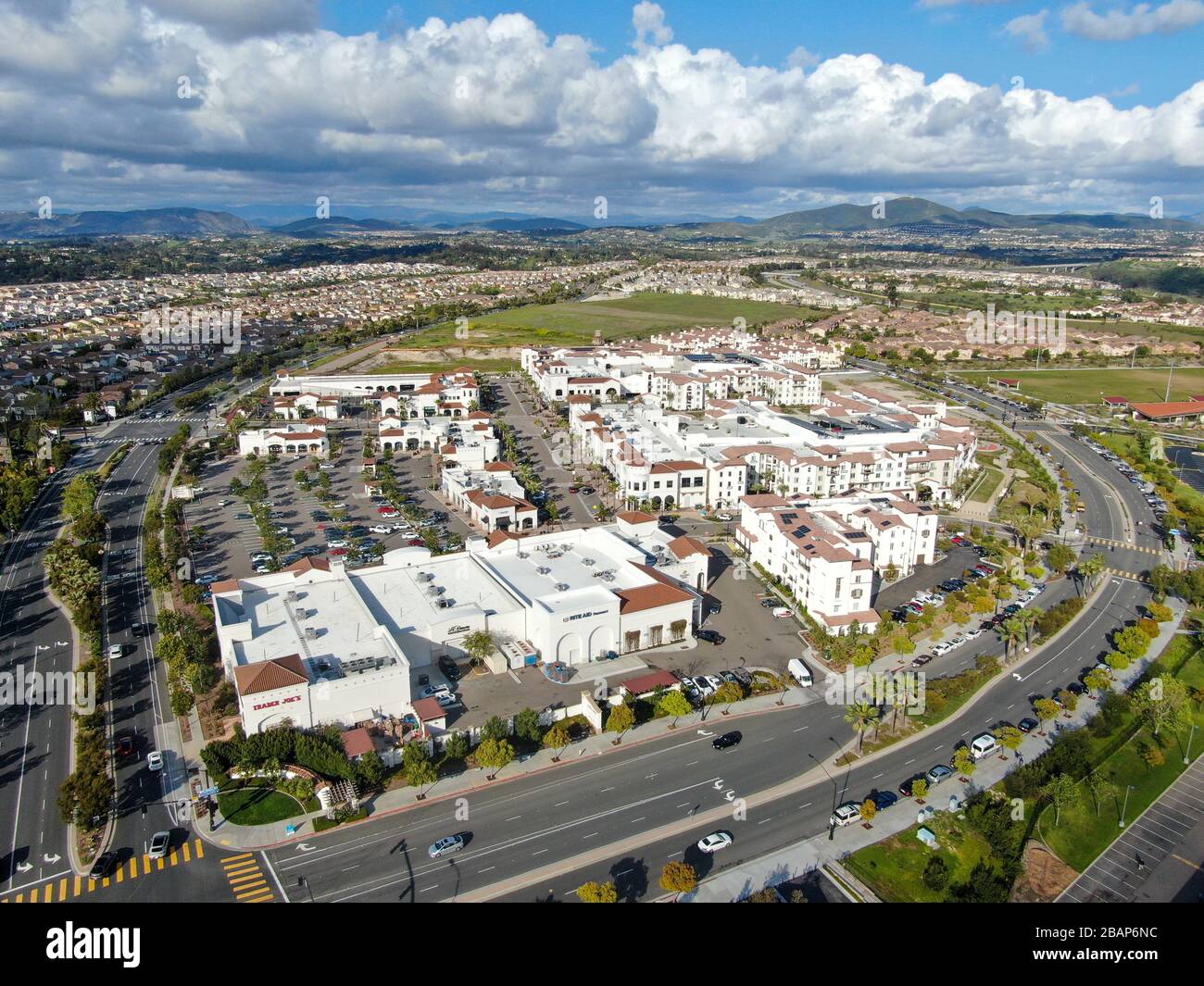 Aerial view of typical small town shopping center with parking . Carmel Valley, San Diego, California, USA. March 28th, 2020 Stock Photo