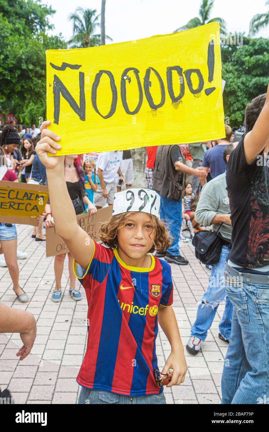 Boy boys male kids children holding sign hi-res stock photography and ...