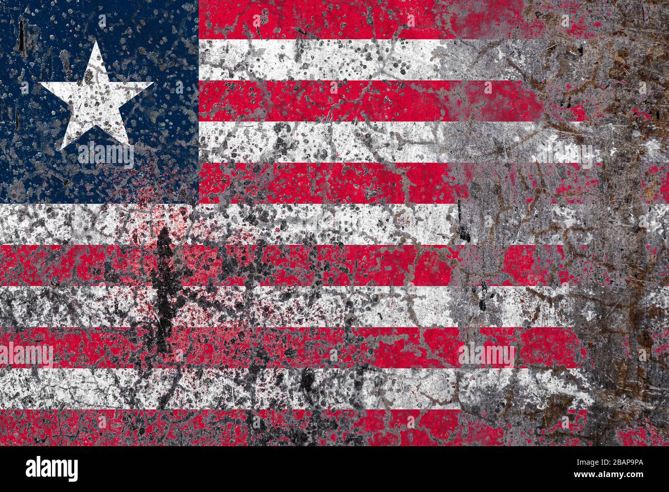 National flag of Liberia on old peeling wall background.The concept of ...