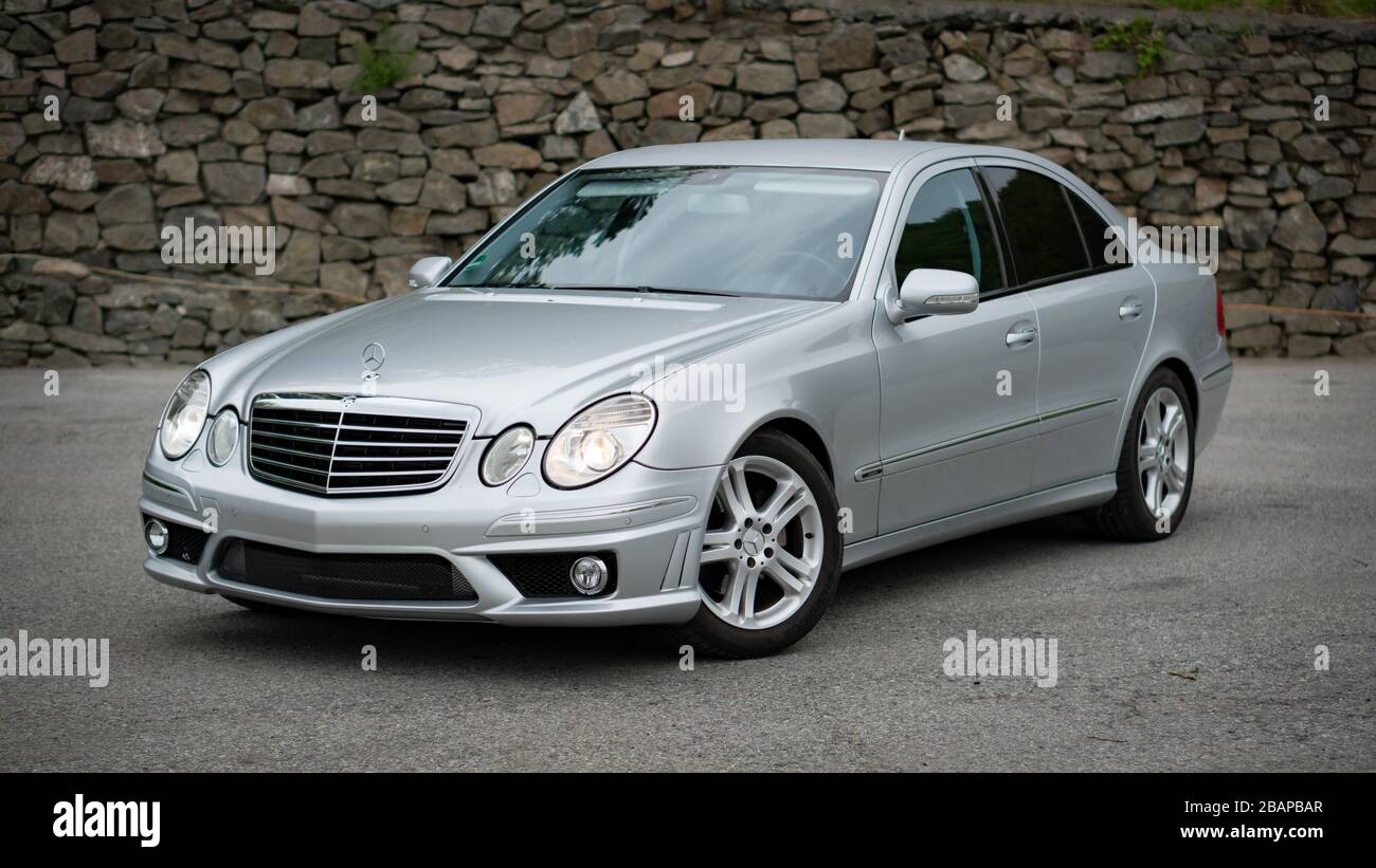 Beautiful Avantgarde Mercedes Benz W211, year 2008, manual transmission,  winter rims, isolated, no people, in an empty parking lot Stock Photo -  Alamy