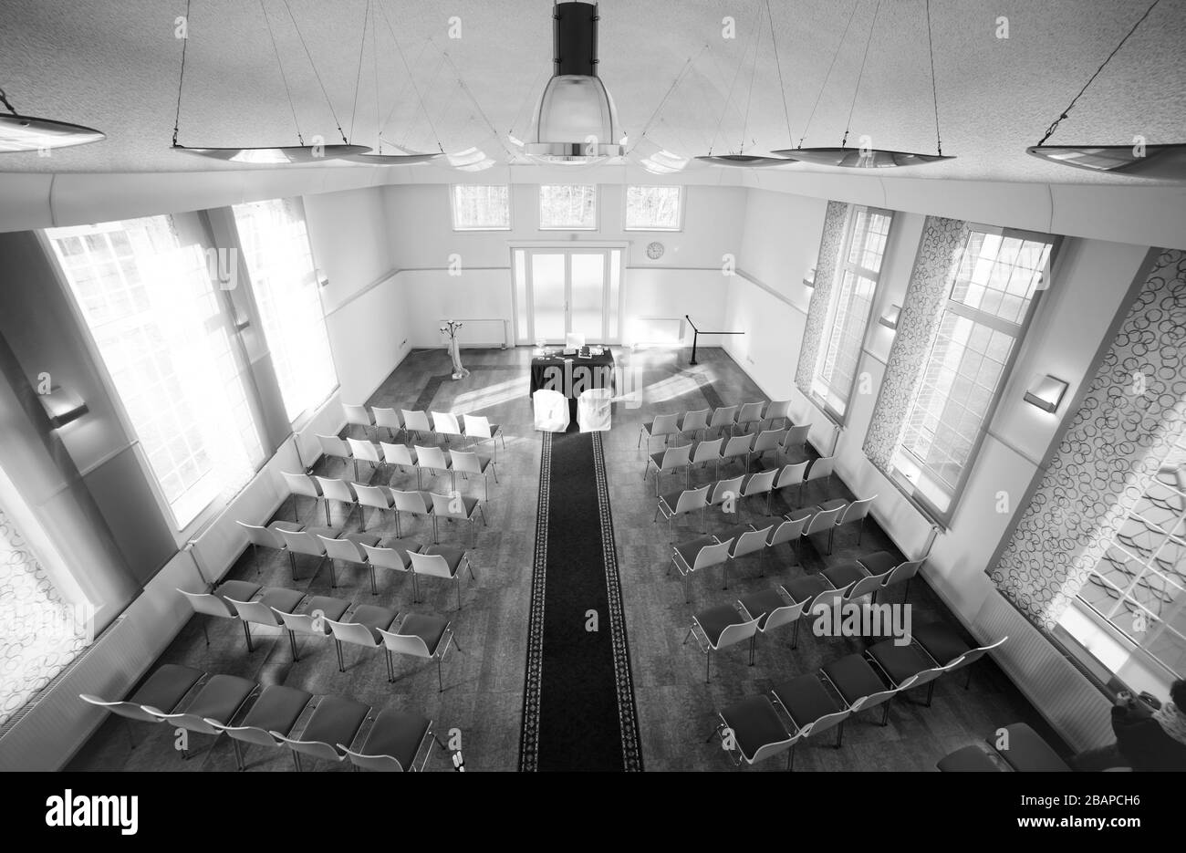 symmetric wedding reception hall awaiting guests and bride and groom Stock Photo