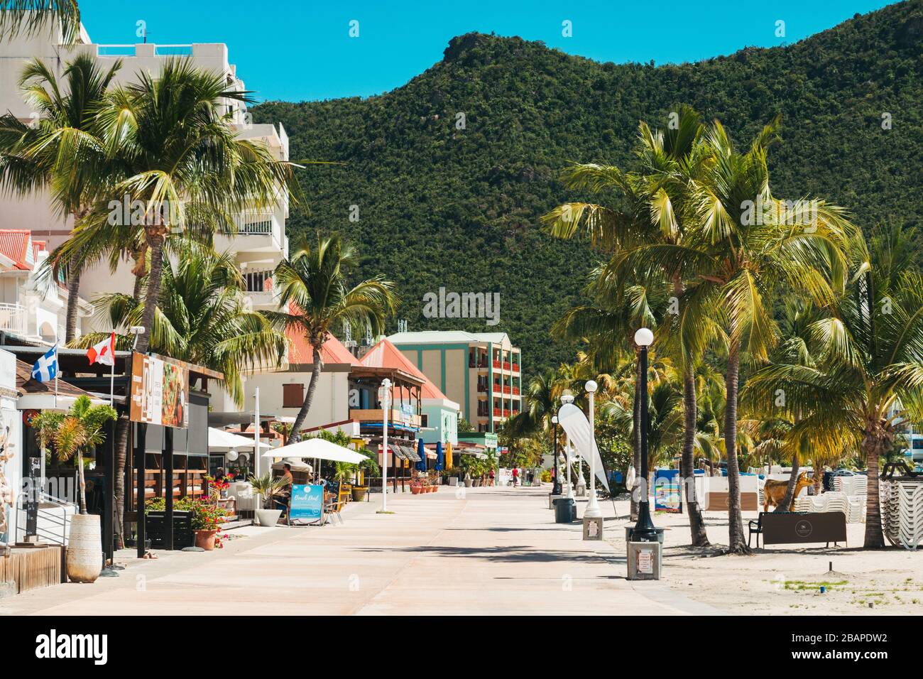 A near-deserted promenade in Philipsburg, St. Maarten. COVID19 created an absence of cruise ship passengers which typically flood the area Stock Photo
