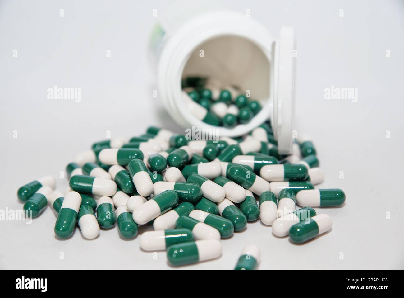 Natural remedy. Organic pills. Capsules of artichoke extract. Stock Photo