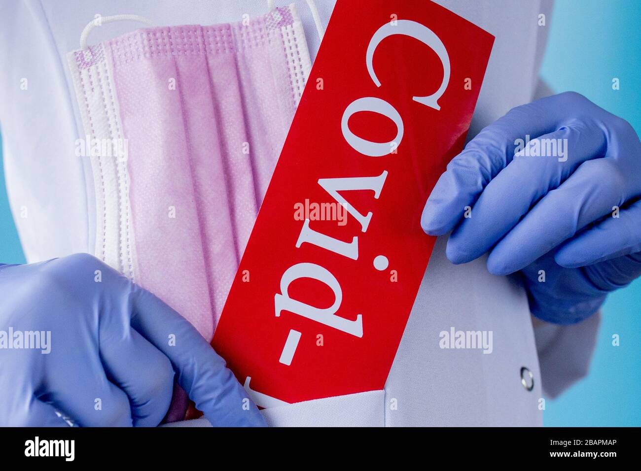 medical mask and inscription COVID-19 in Doctor's Pocket Stock Photo ...