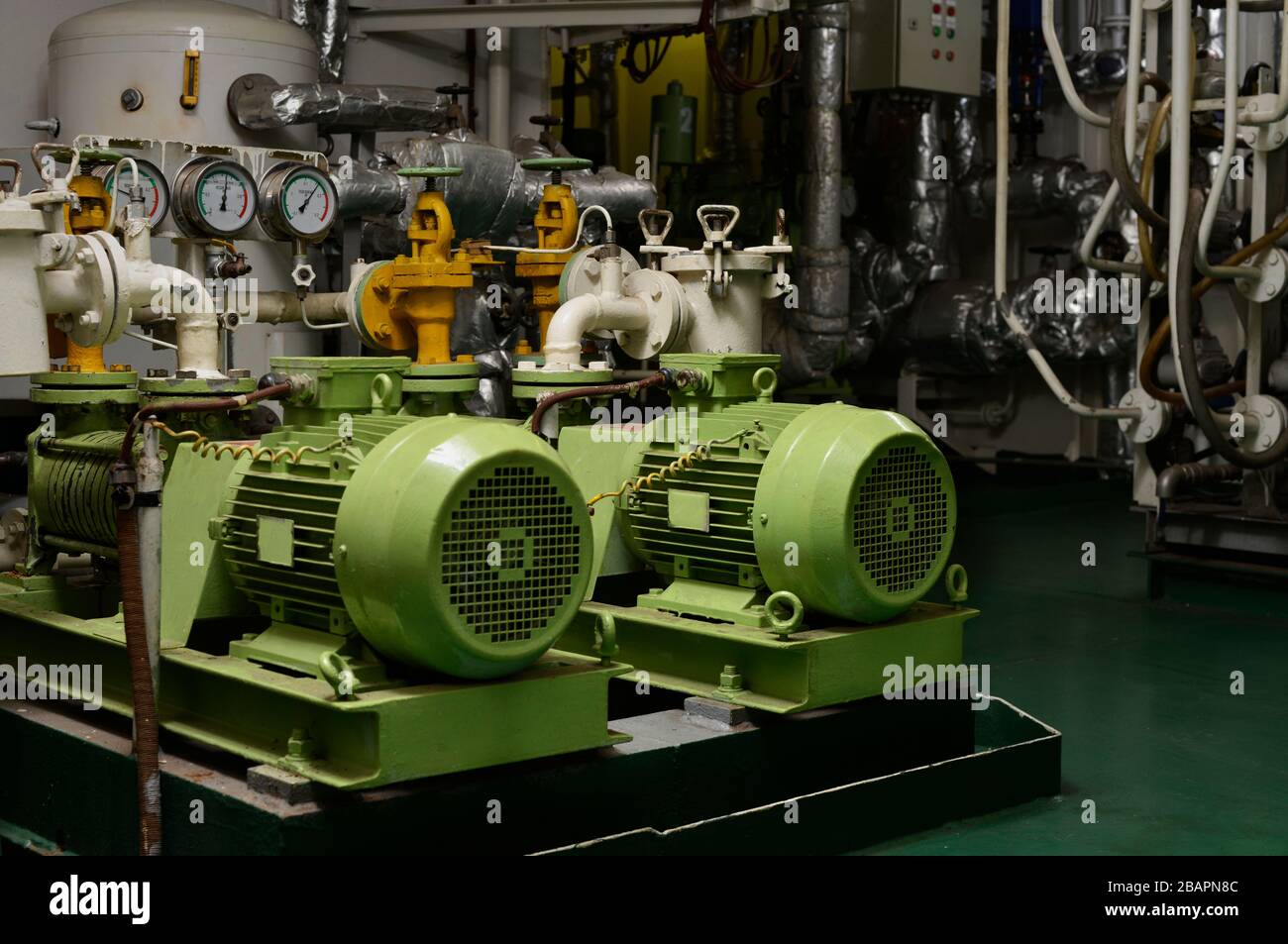 Engine room interior of a big ocean going ship with electrical motors,  piping, gauges, valves etc Stock Photo - Alamy