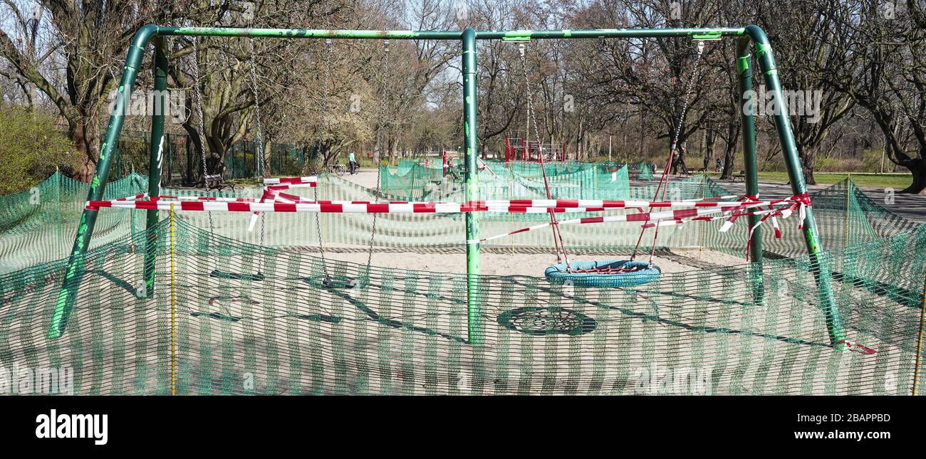 The image was taken in Leipzig, eastern germany. It shows a closed playground during the time of corona quarantene. Children are not allowed to play. Stock Photo
