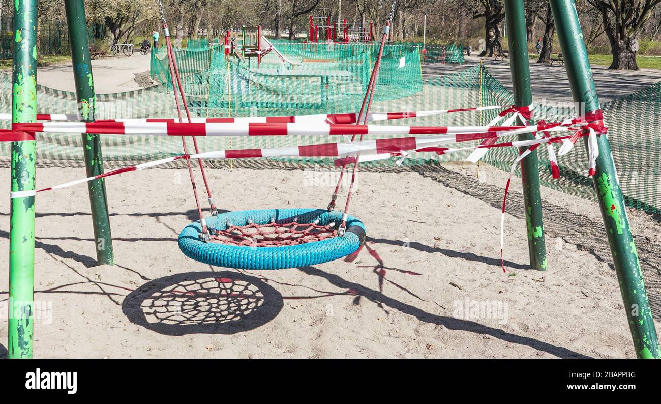The image was taken in Leipzig, eastern germany. It shows a closed playground during the time of corona quarantene. Children are not allowed to play. Stock Photo