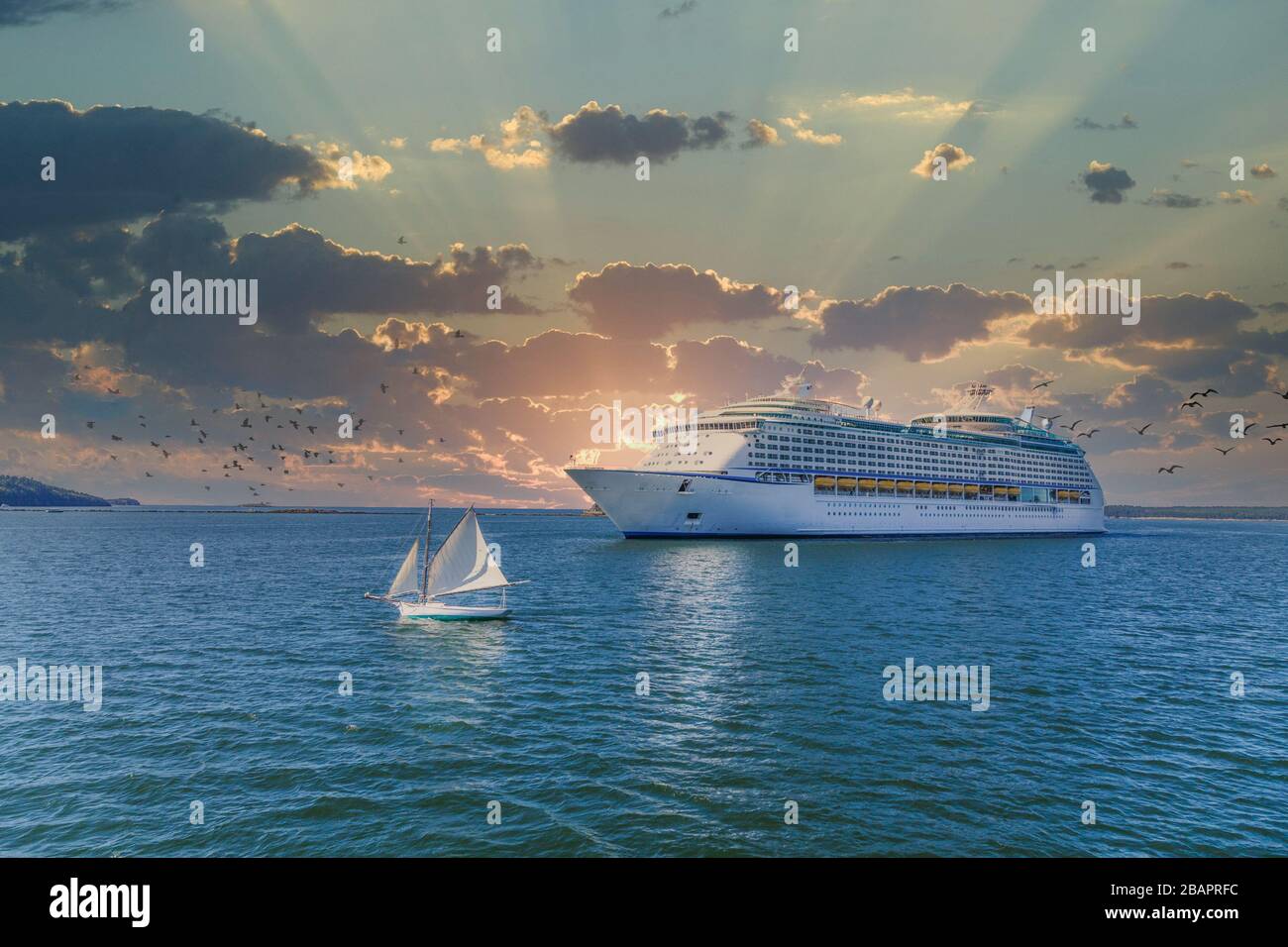 Sailboat and Cruise Ship at Sunset Stock Photo - Alamy