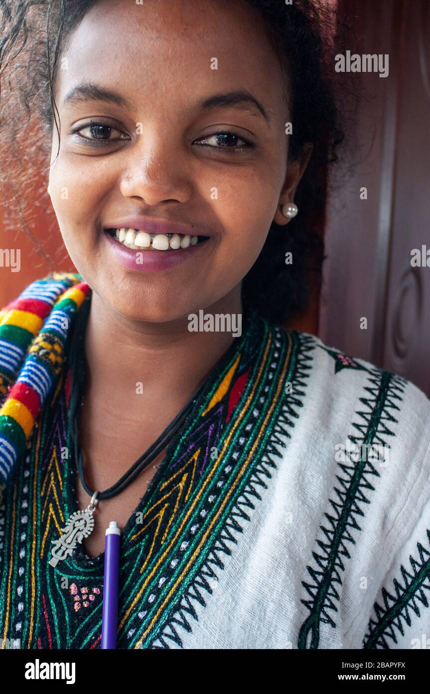 Nice girl in the Street scene in Gondar city, Ethiopia. Gondar is one of the most wonderful sites in the world. Not only for its impressive Royal Pala Stock Photo