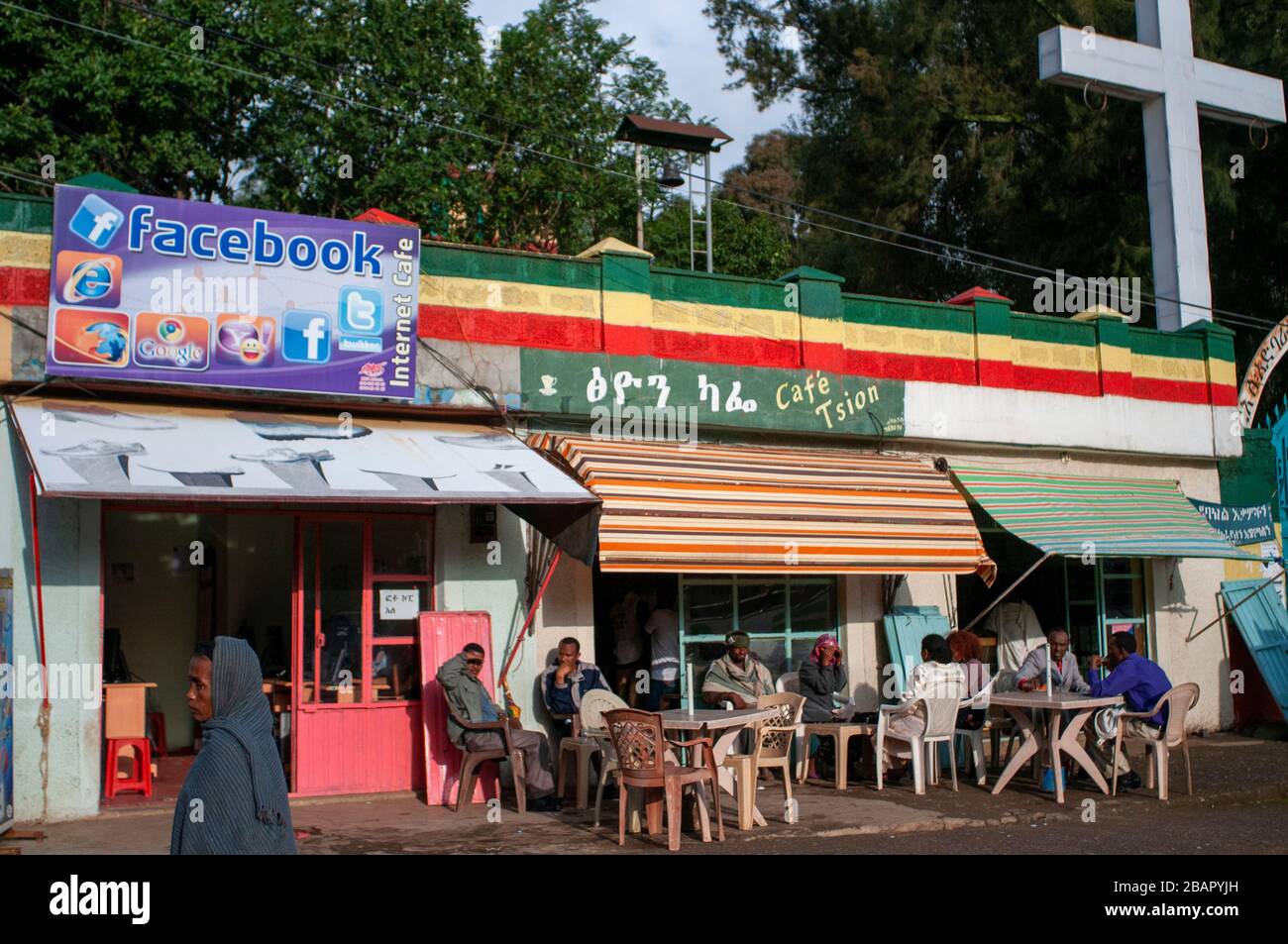 Internet café Facebook next to the old church in Gondar, Ethiopia. In the central square of the city of Gondar stands out the proximity of a new cyber Stock Photo