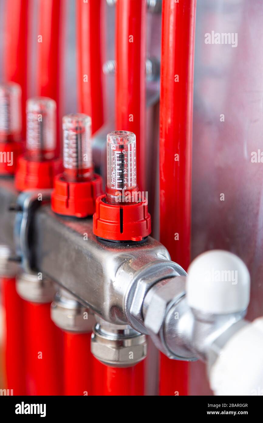 Pipelines in main control manifold of house heating system. Distributor