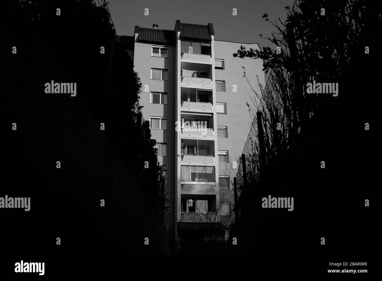 Kranj, Slovenia, March 20, 2020: A view of an apartment building during the coronavirus outbreak nationwide lockdown when people are asked to stay at home. Stock Photo