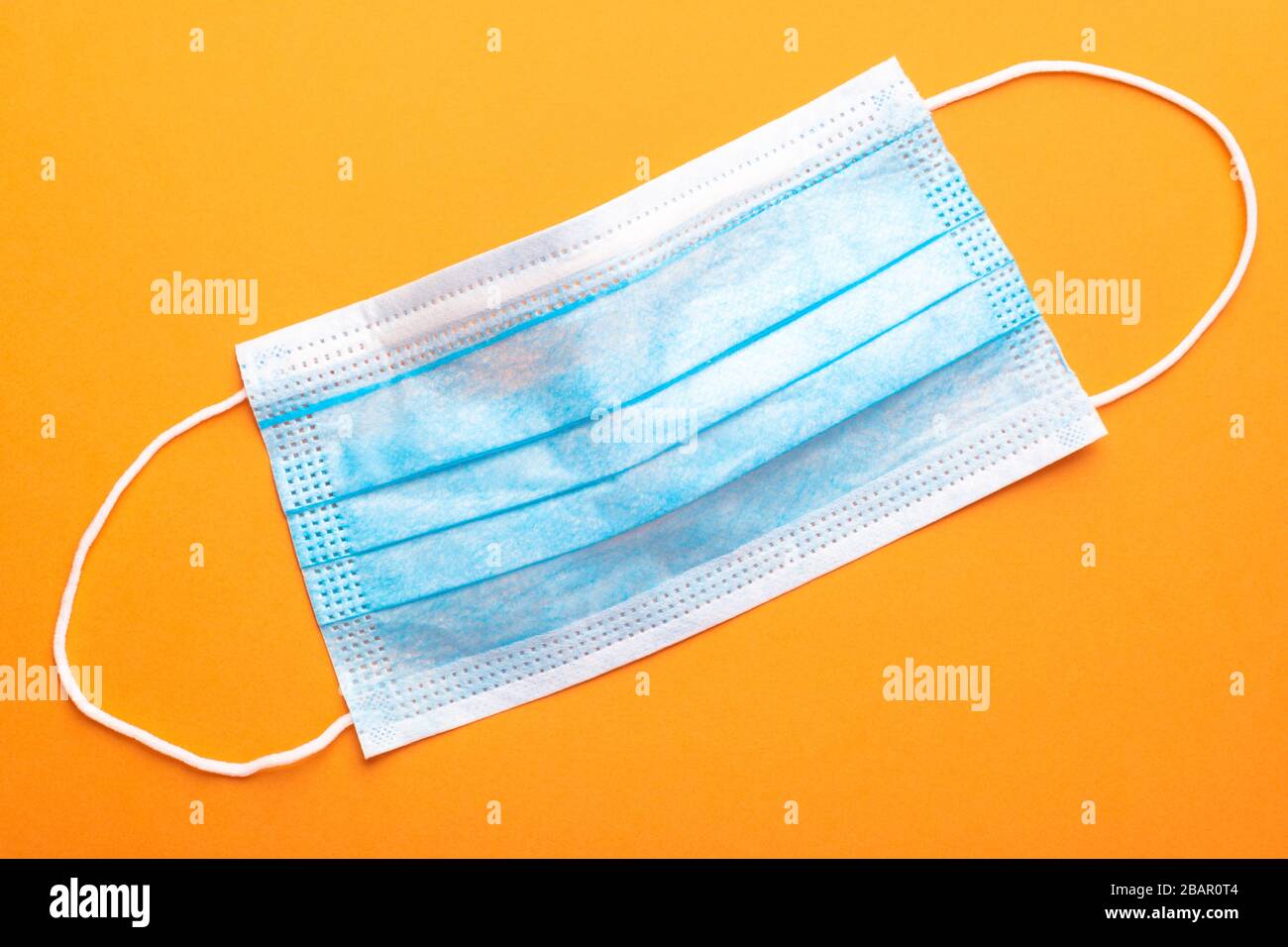 Medical Mask On A Yellow Background Close Up Protection Concept Stock Photo Alamy