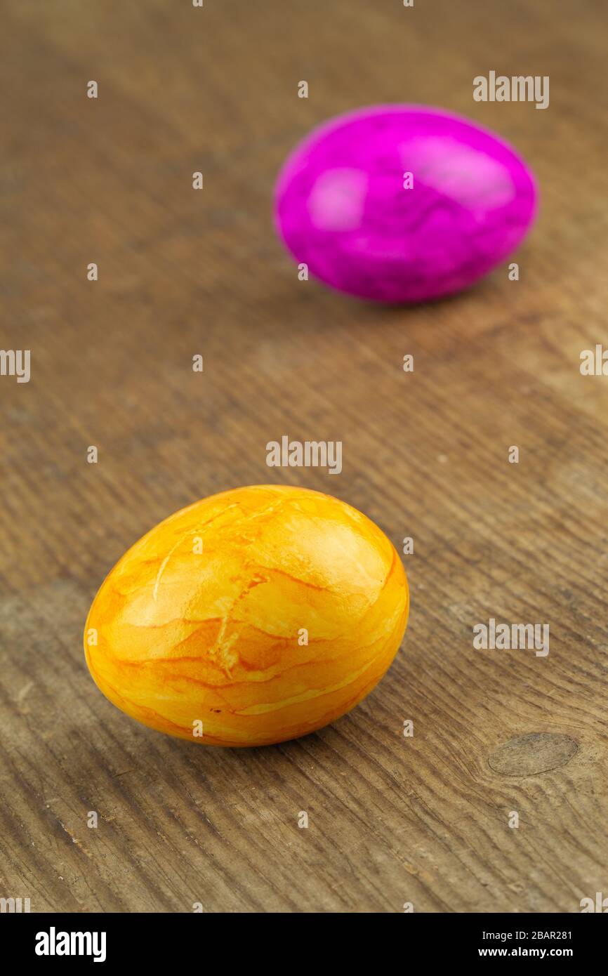 colorful easter eggs on a wooden board Stock Photo